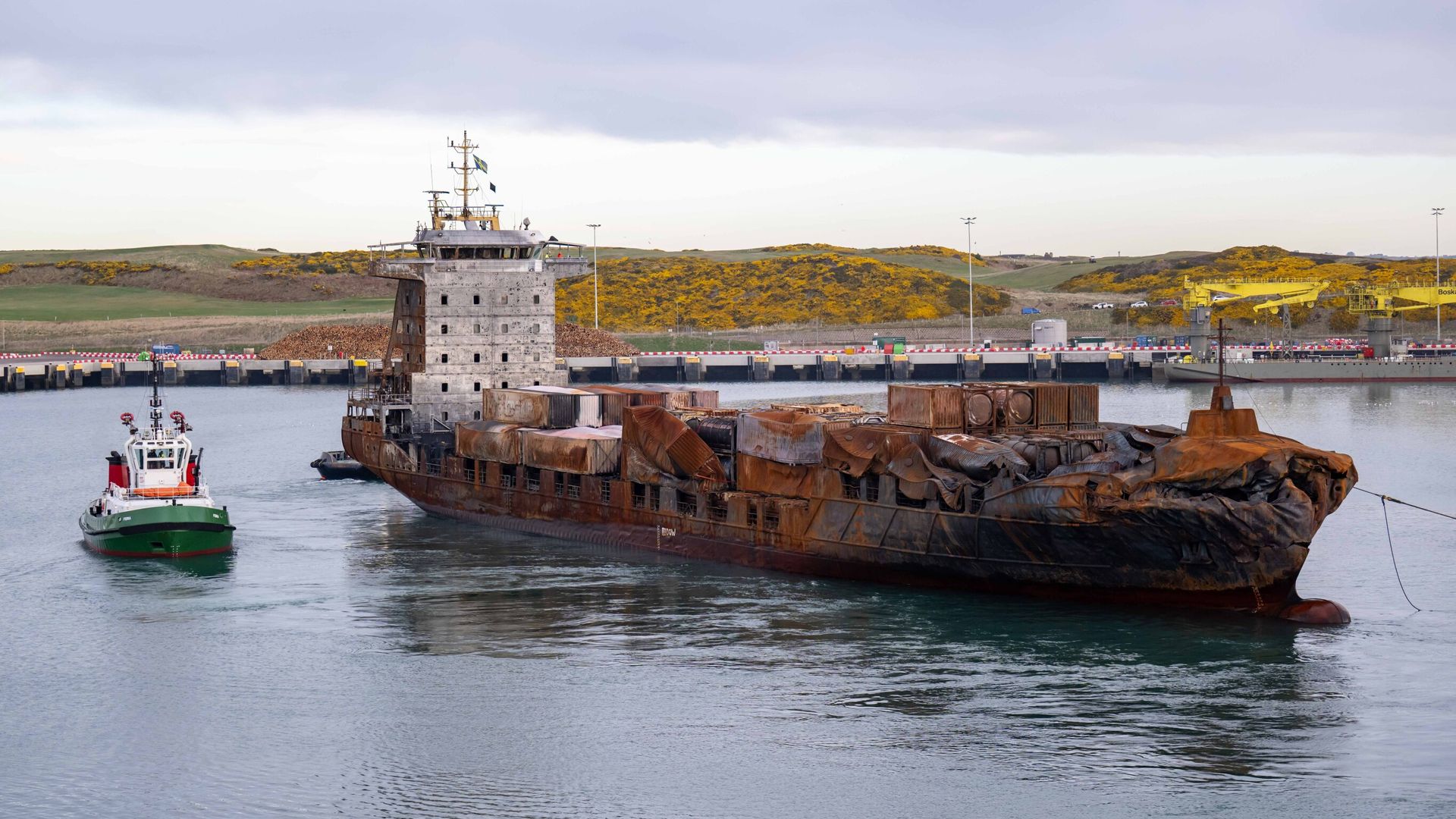 Container ship damaged in crash with North Sea oil tanker arrives in Scotland