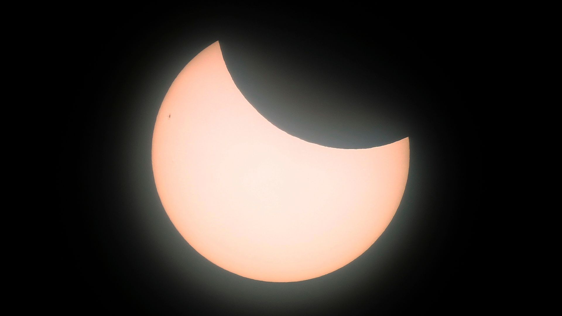 ‘Experiencing the solar system for yourself’: Sun obscured over the UK in partial solar eclipse