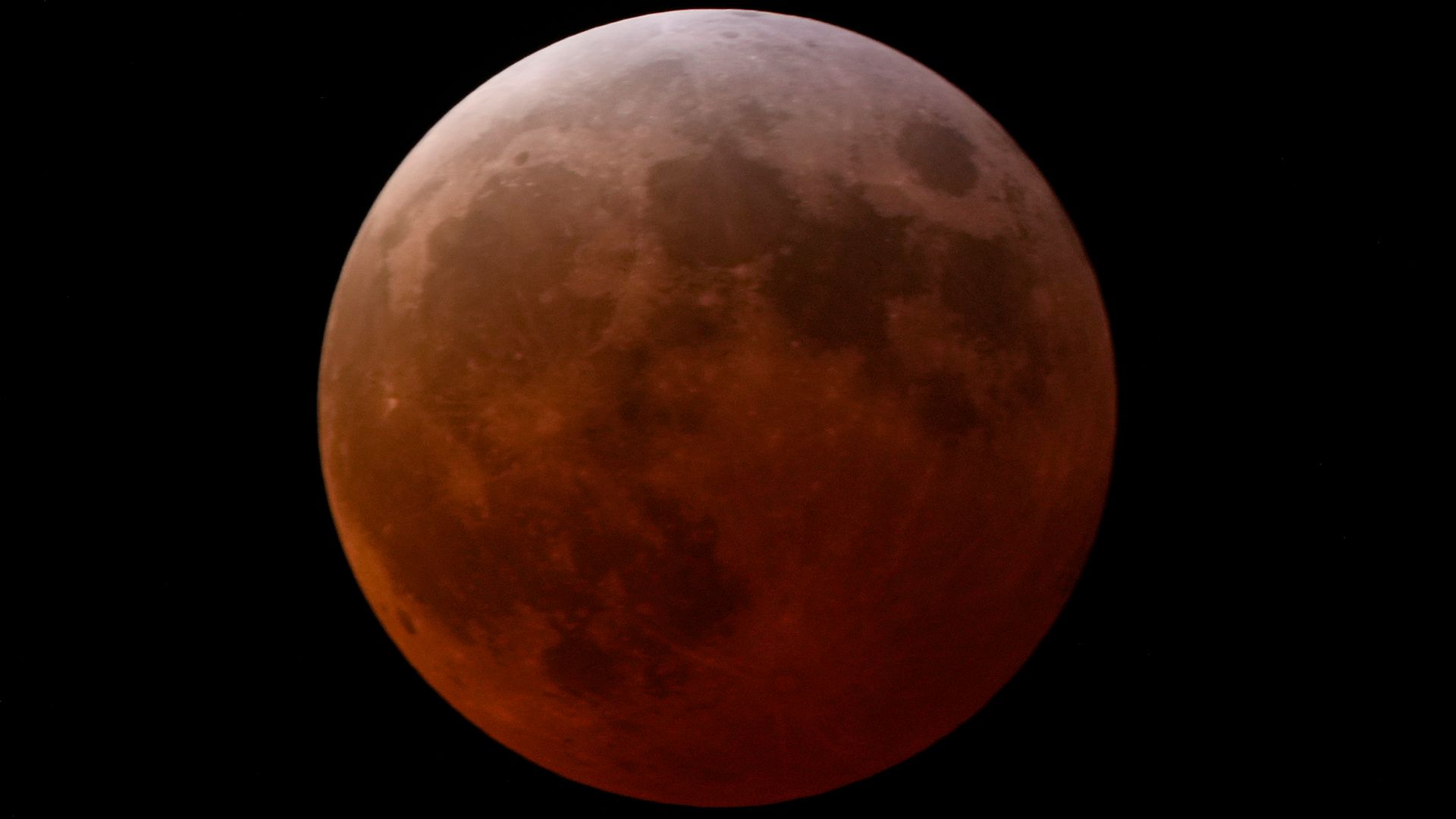 Blood moon visible across the globe following lunar eclipse