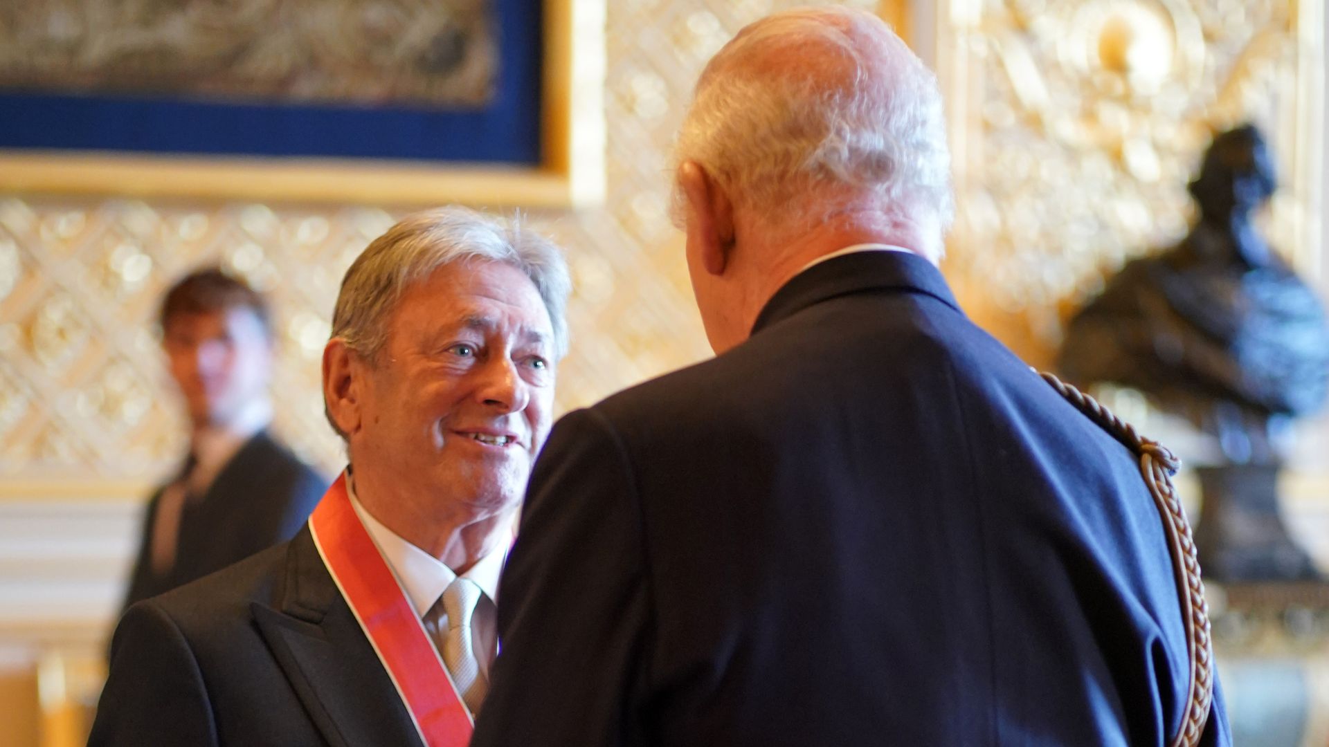 King honours Alan Titchmarsh and Olympic star in first public engagement since short hospital stay