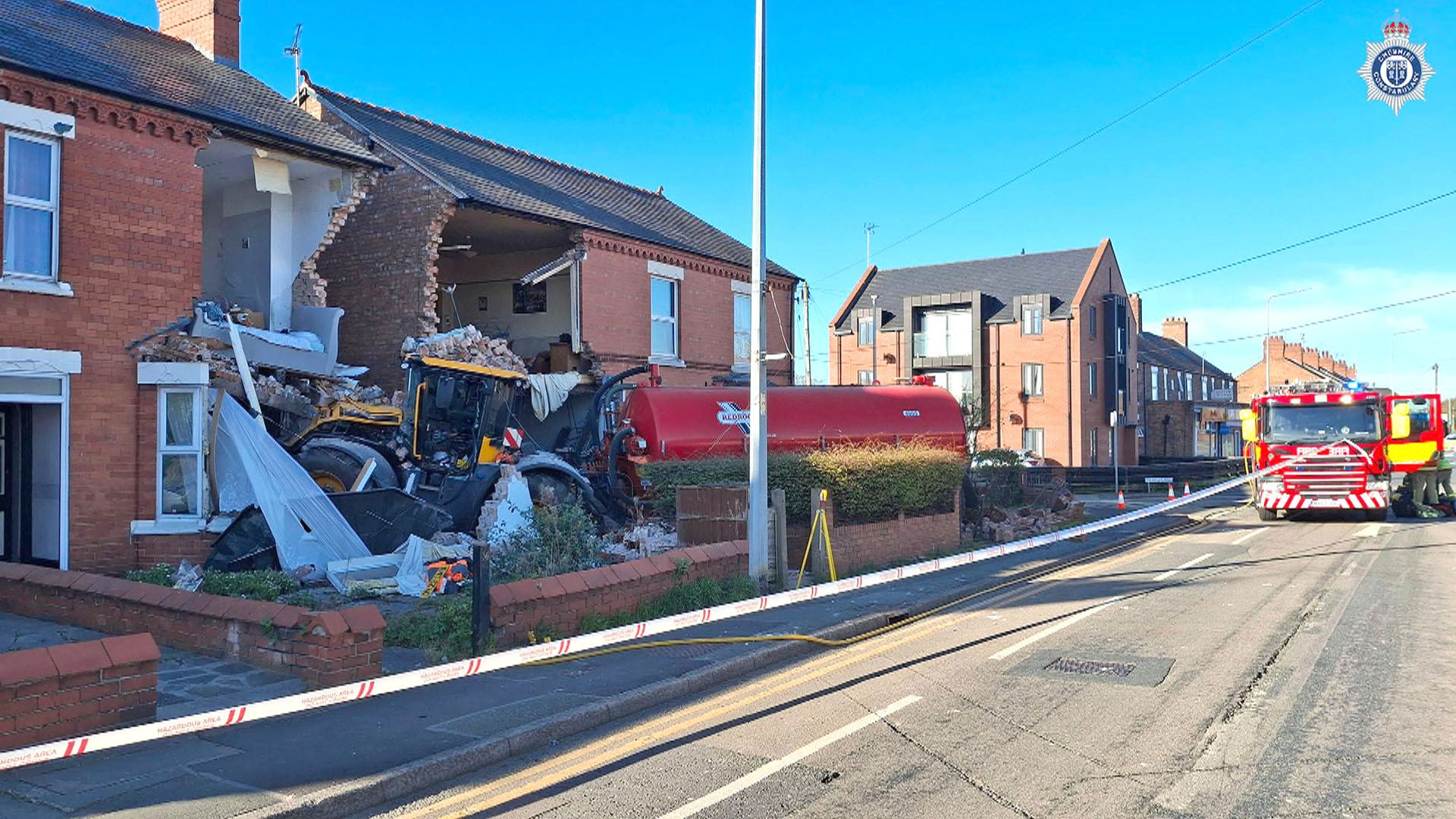 Tractor crashes into houses knocking down their front walls