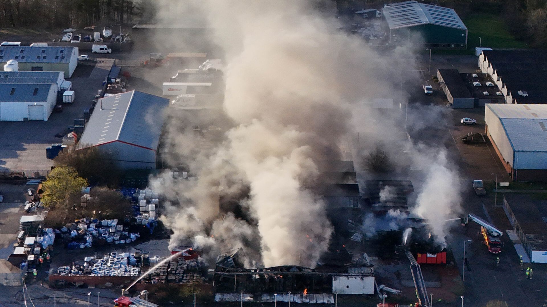 Six people in hospital after huge fire at industrial estate