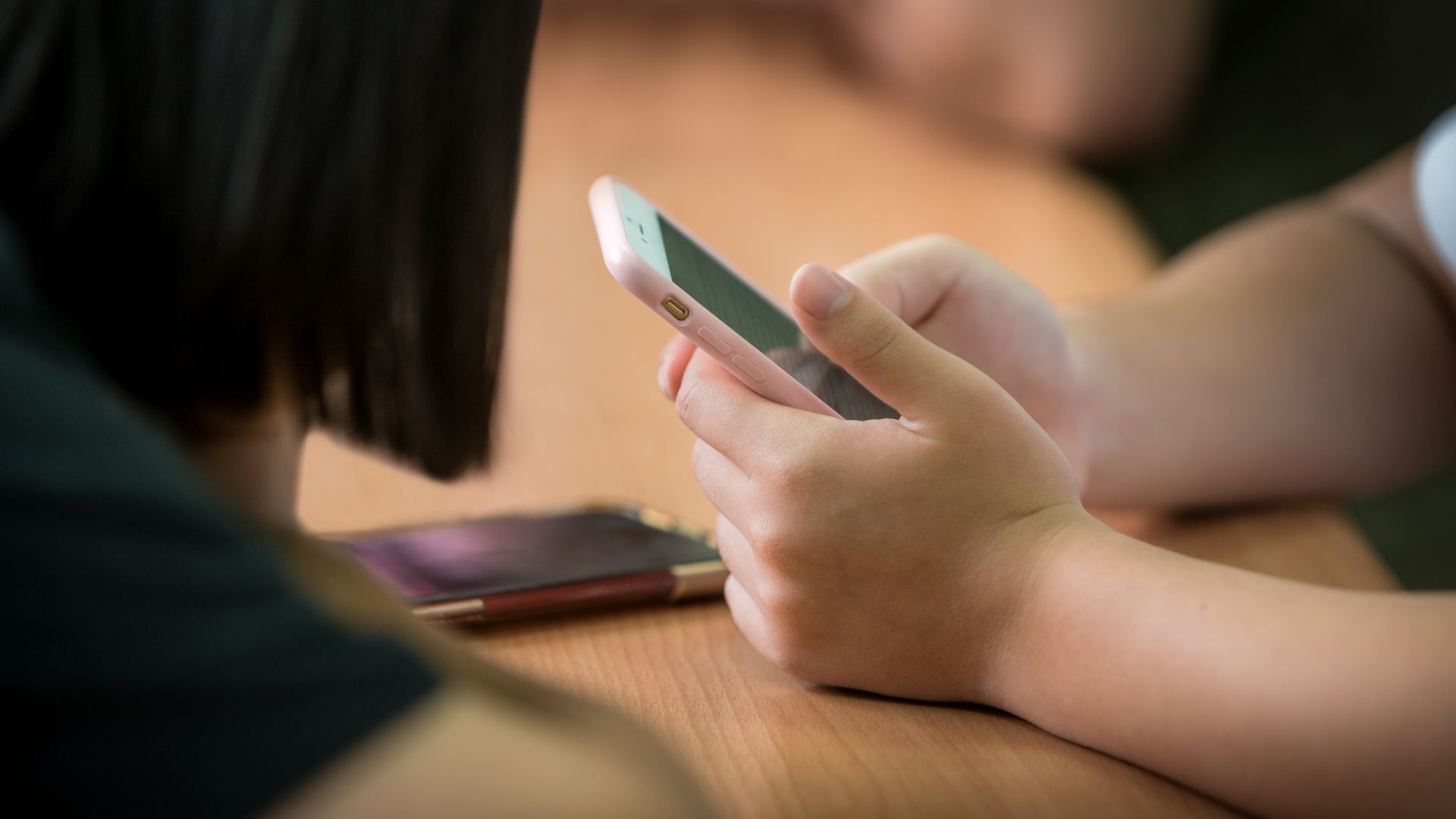 ‘Whole society’ approach needed to stop pupils doom scrolling – with most schools already banning phones