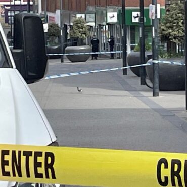 Man charged with murder after stabbing inside bank