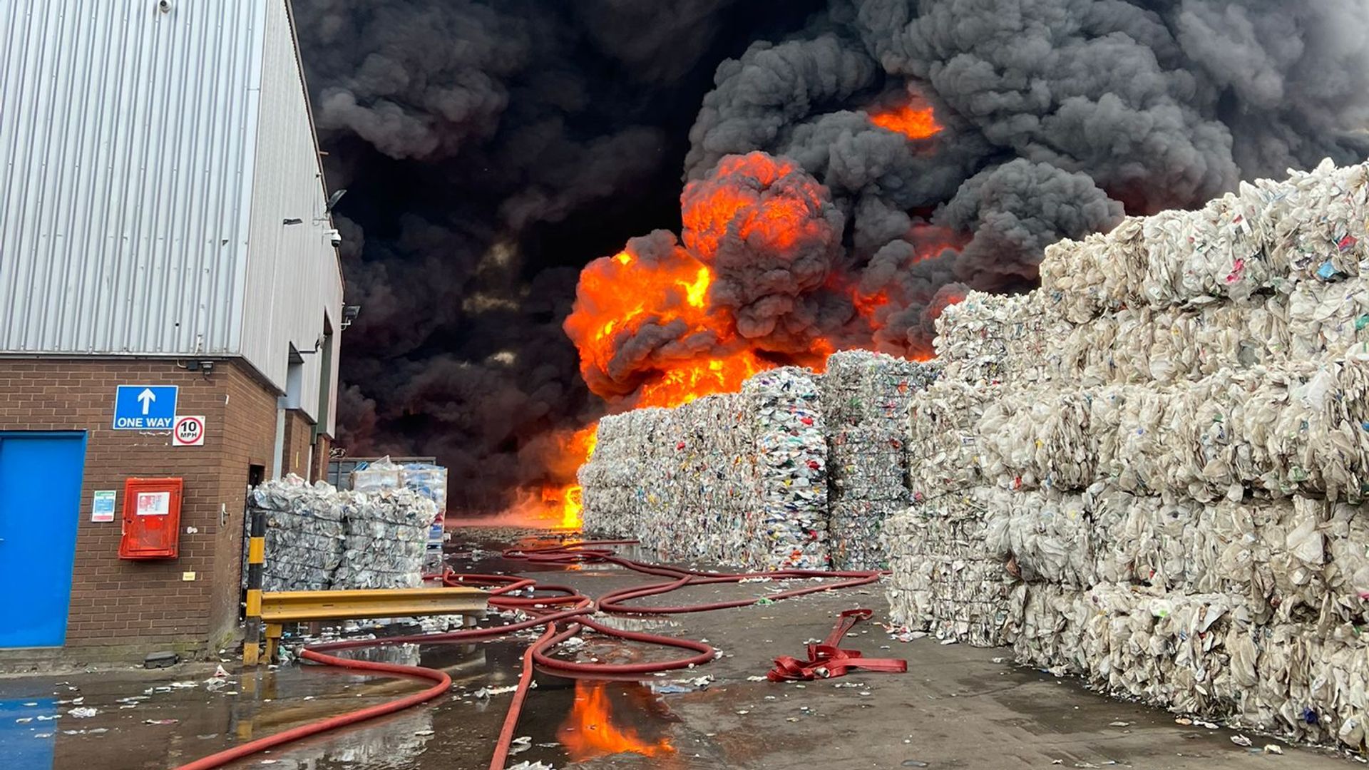 Firefighters battling large blaze at recycling warehouse
