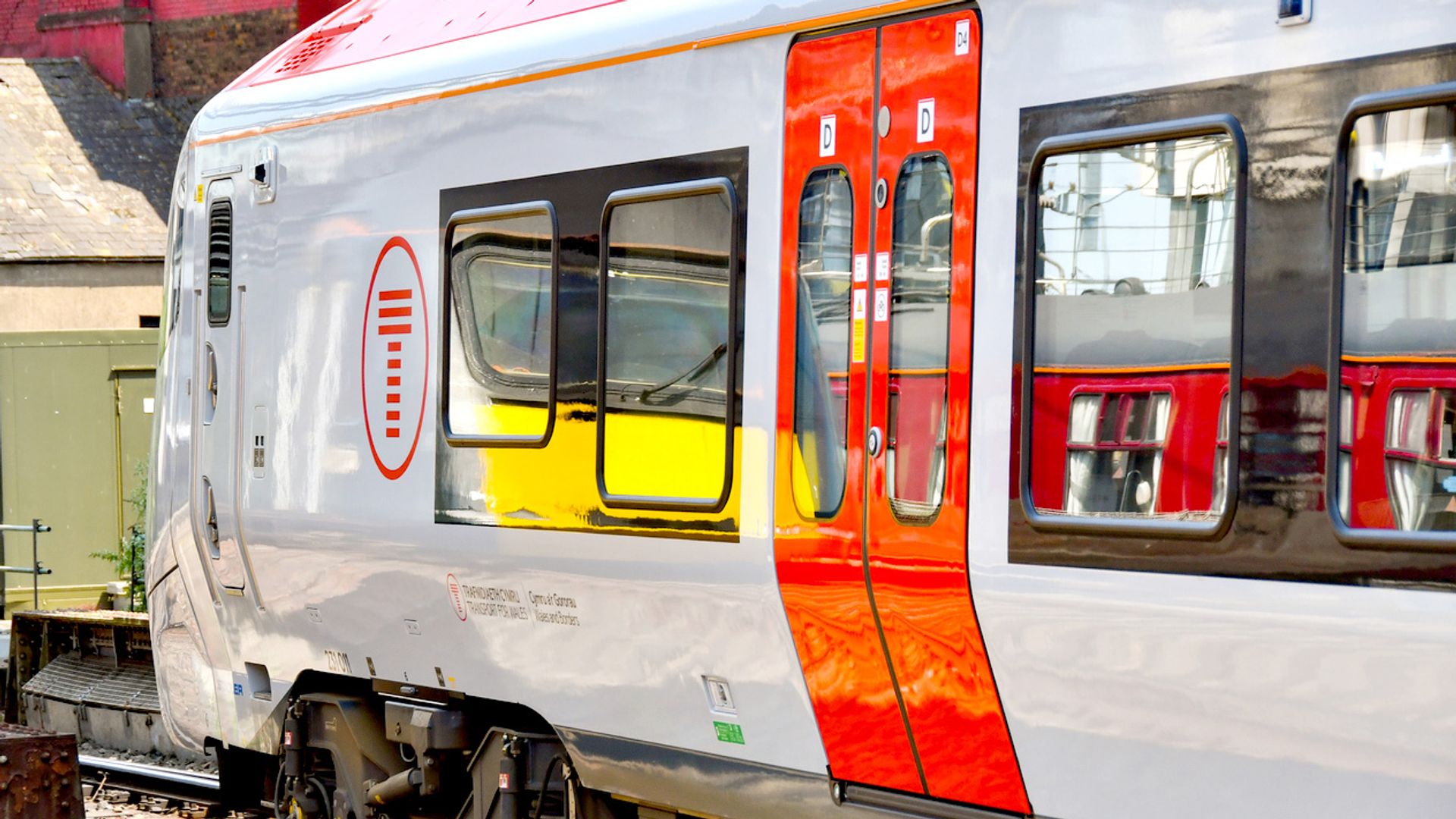 Six injured after train hits tractor at level crossing