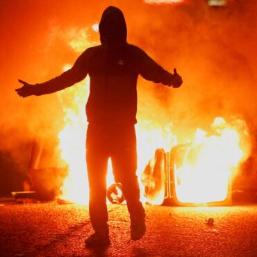 Baton rounds, firebombs and water cannon as families flee ‘locals’ venting their feelings