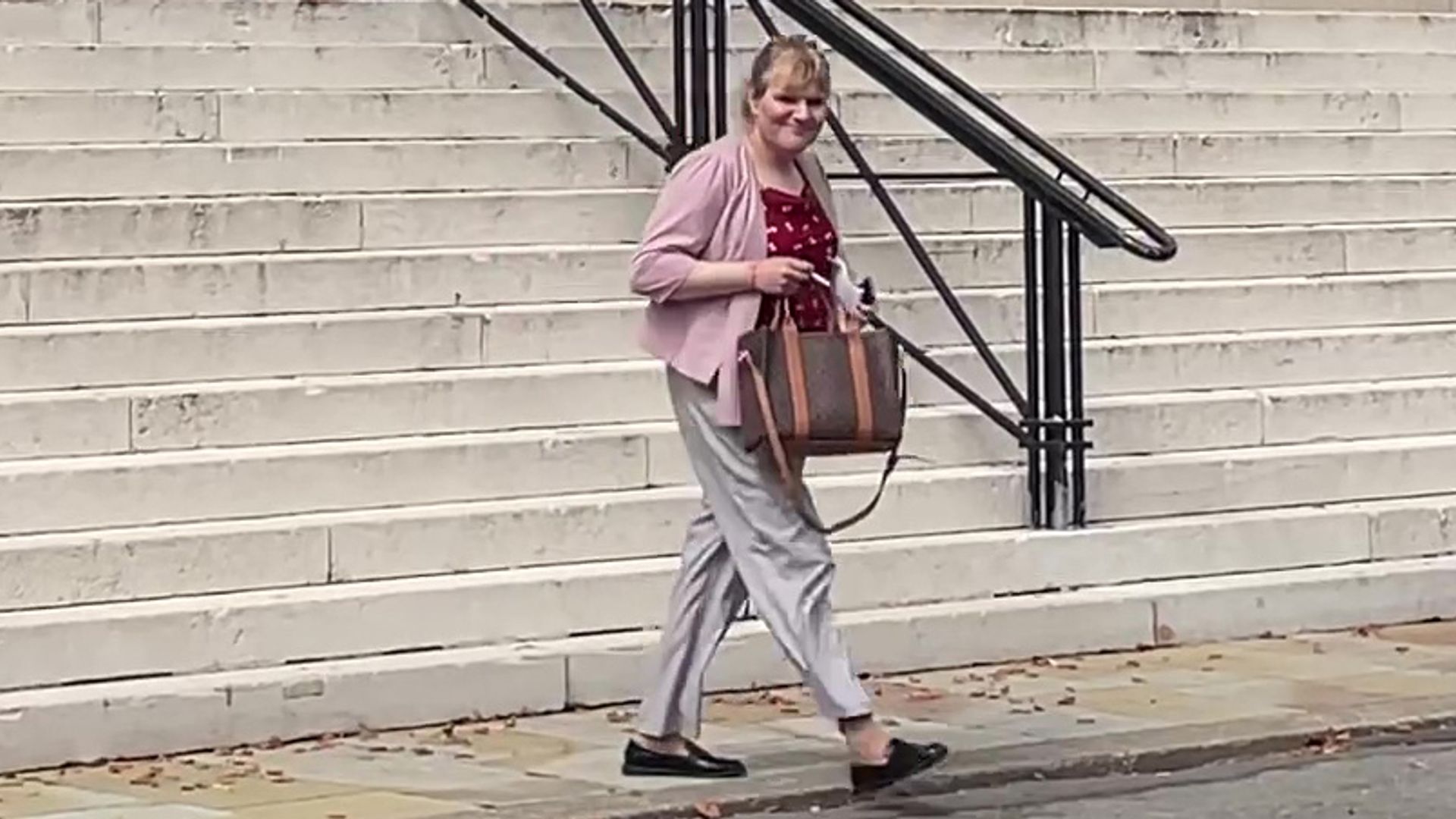 Former Conservative MP appears in court accused of having false passport