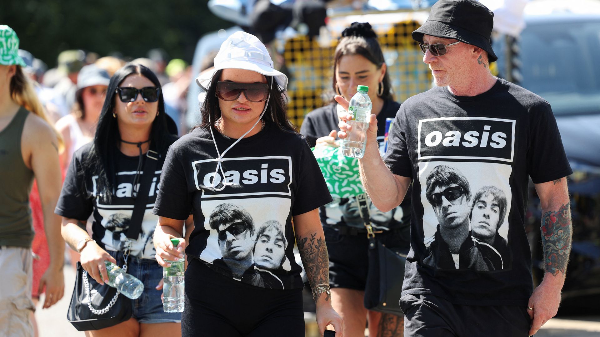 ‘It’s a cultural moment’: Oasis fans queue all day for Manchester homecoming gig