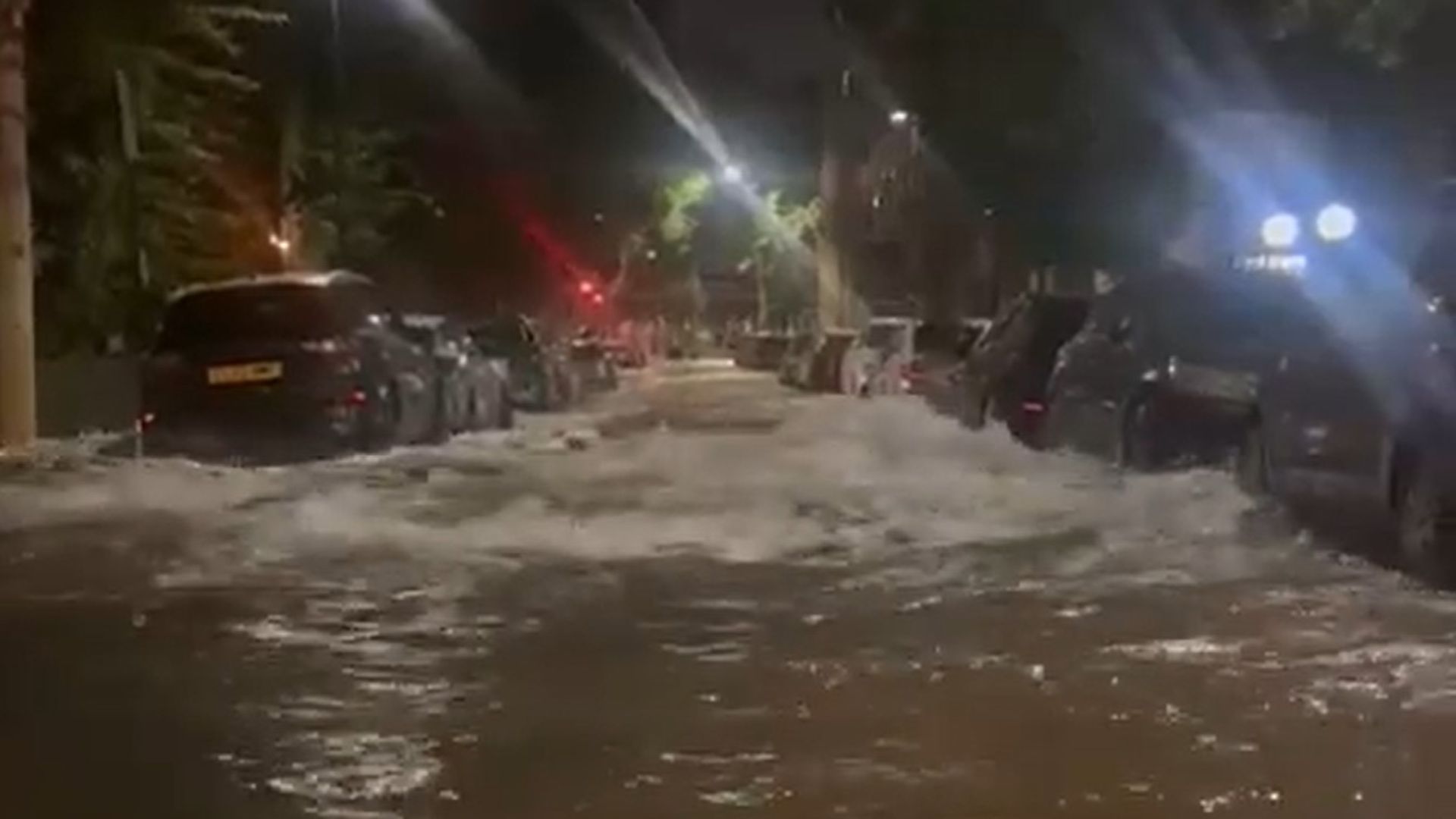 Dozens evacuated after burst water main floods streets
