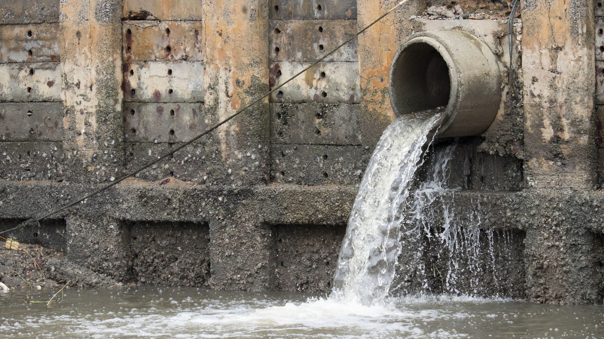Water firms fined £87m for sewage failures