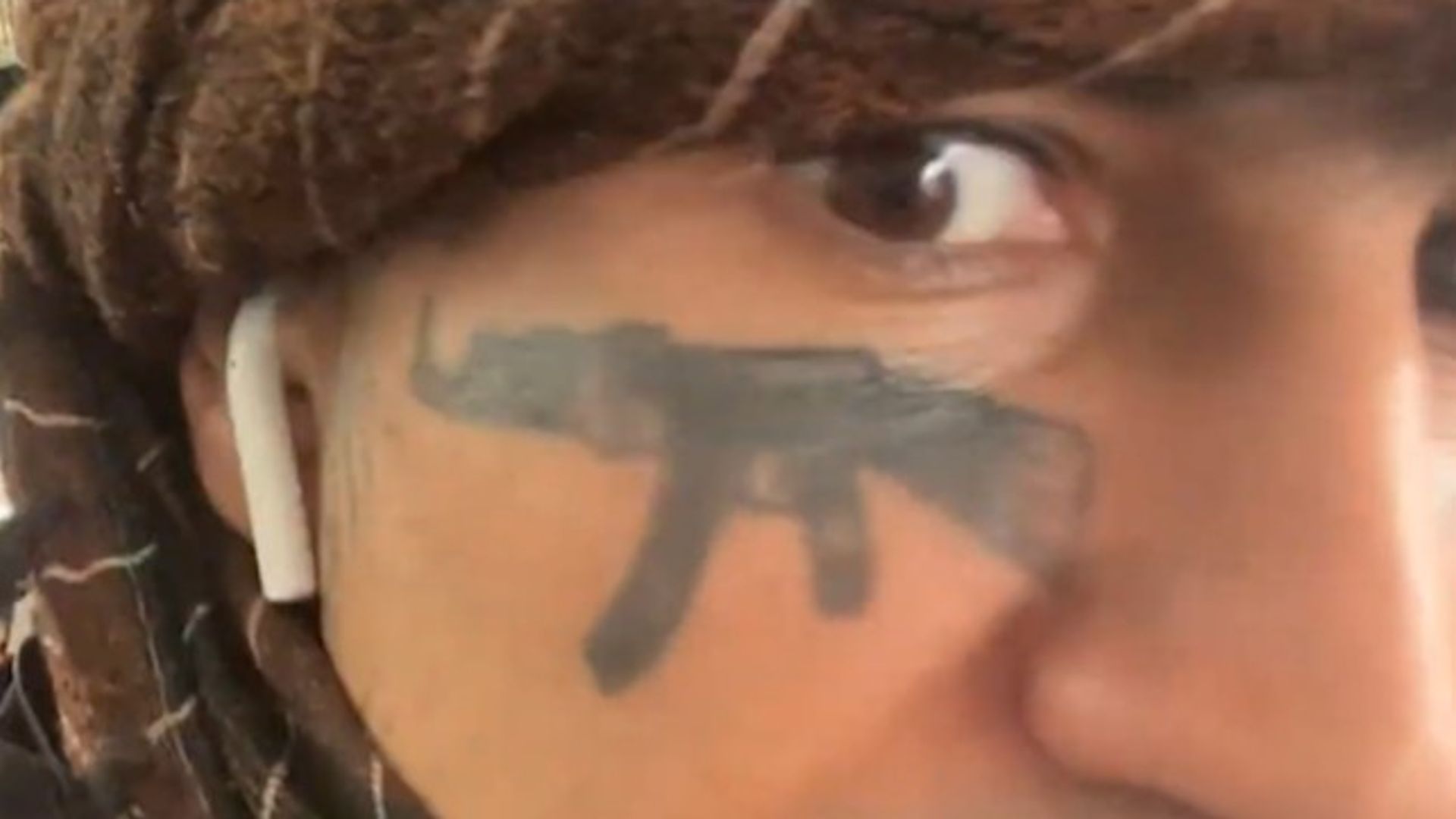 Migrant with AK-47 face tattoo who threatened to kill Farage shouts from dock as he’s jailed