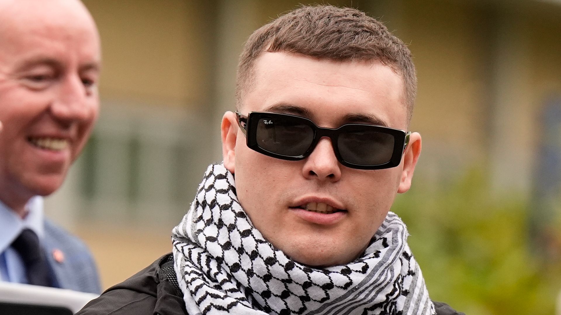 Prosecutors to appeal against decision to throw out terror case against Kneecap rapper