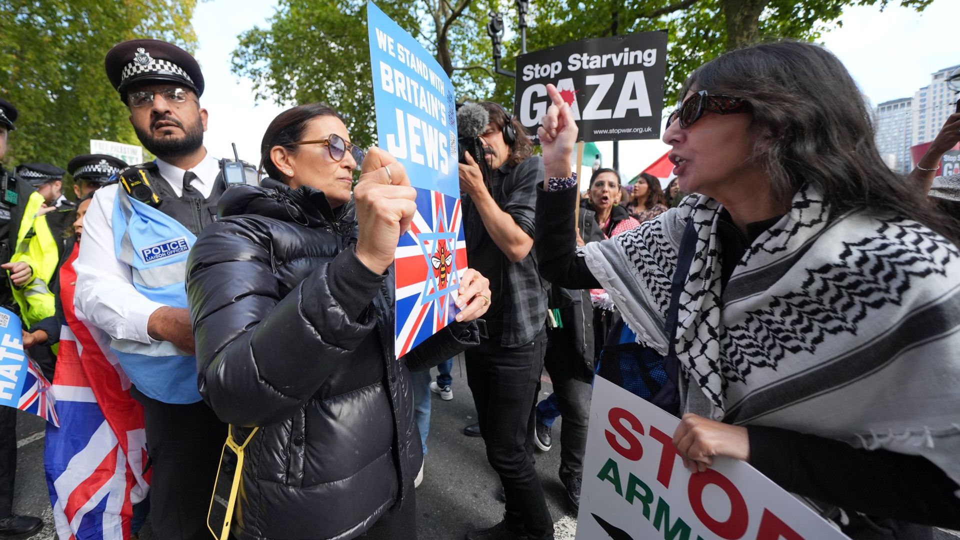 Police try to keep rival protesters apart as demo marks two years since Gaza war