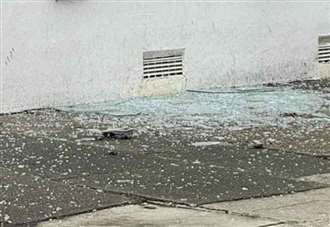 Smashed window and blood on door as forensics called to residential street