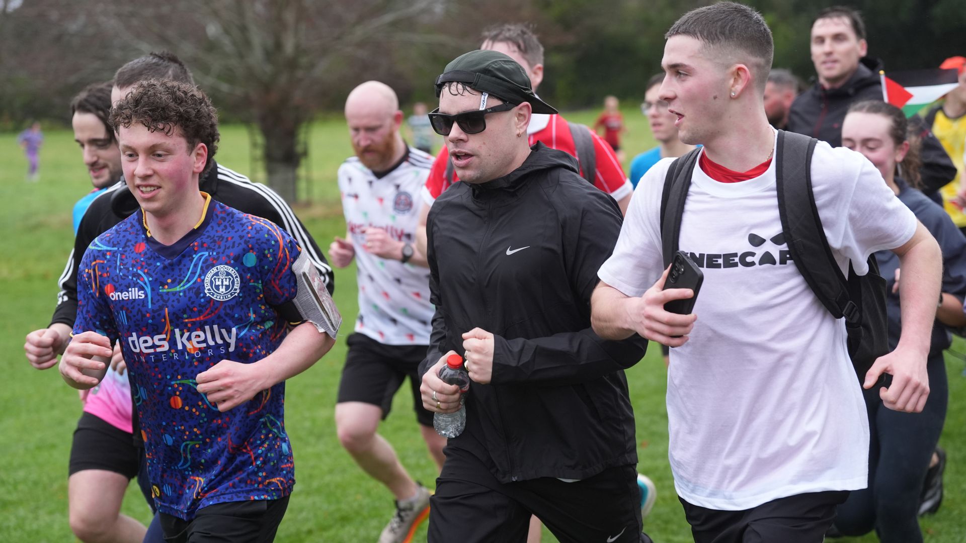 Kneecap’s charity run cheered on by Irish president
