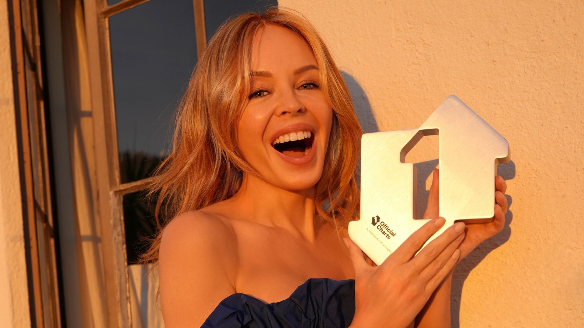 Kylie Minogue secures her first Christmas number one in UK
