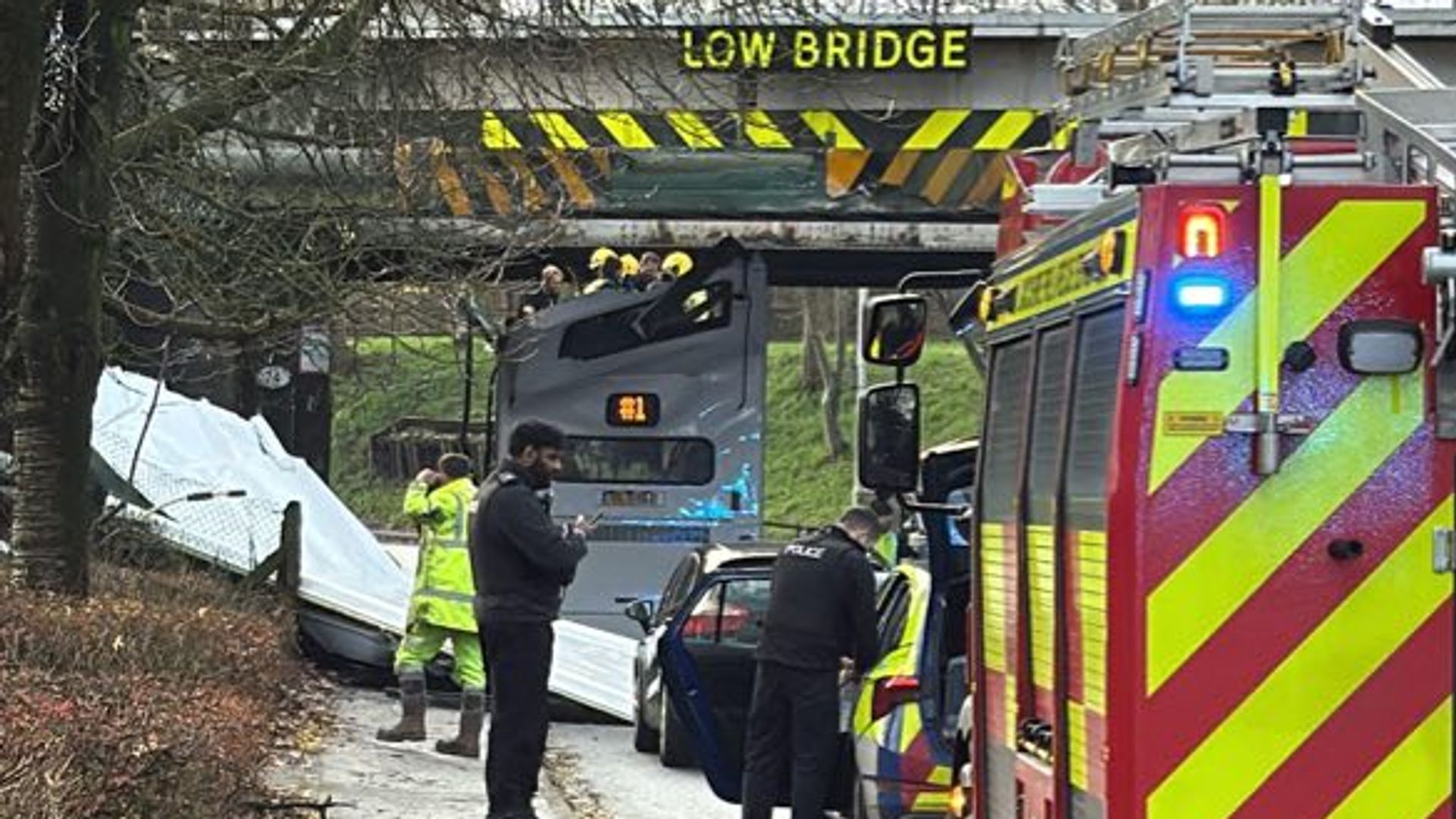 Children hurt after roof ripped off double-decker bus