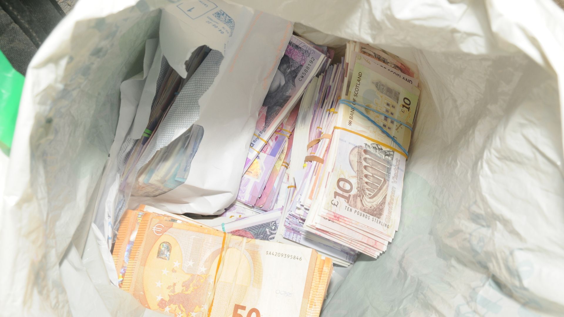 Gang jailed over guns and drug operation able to making ‘tens of thousands’ of pills per hour