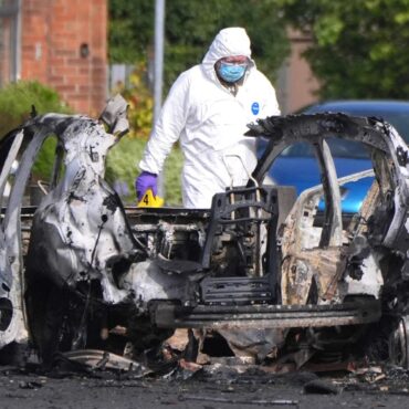 Babies among residents rushed to safety as car bomb explodes next to police station
