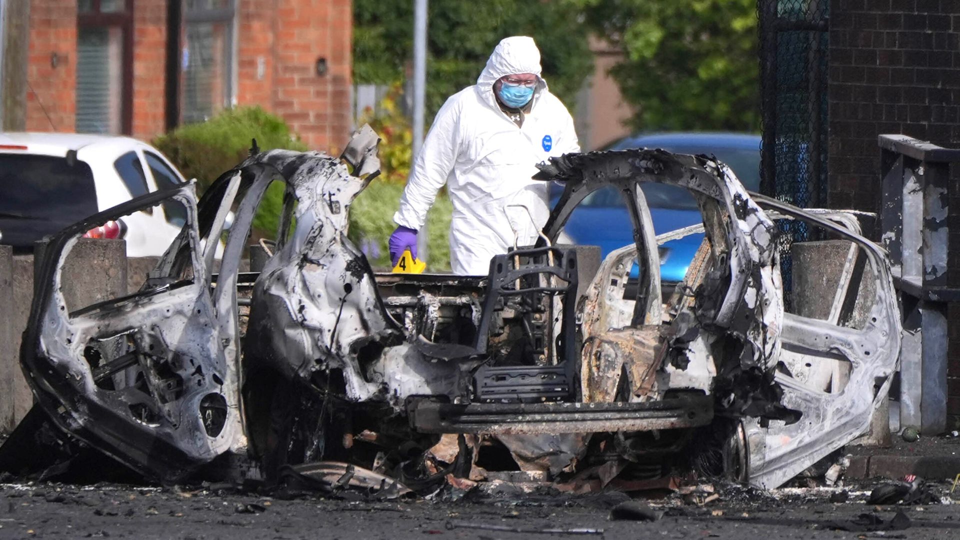 Babies among residents rushed to safety as car bomb explodes next to police station