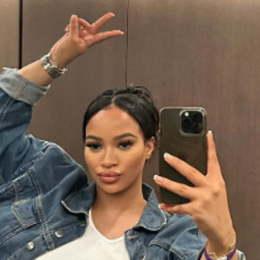X Factor finalist accused of attempted murder makes heart sign from dock