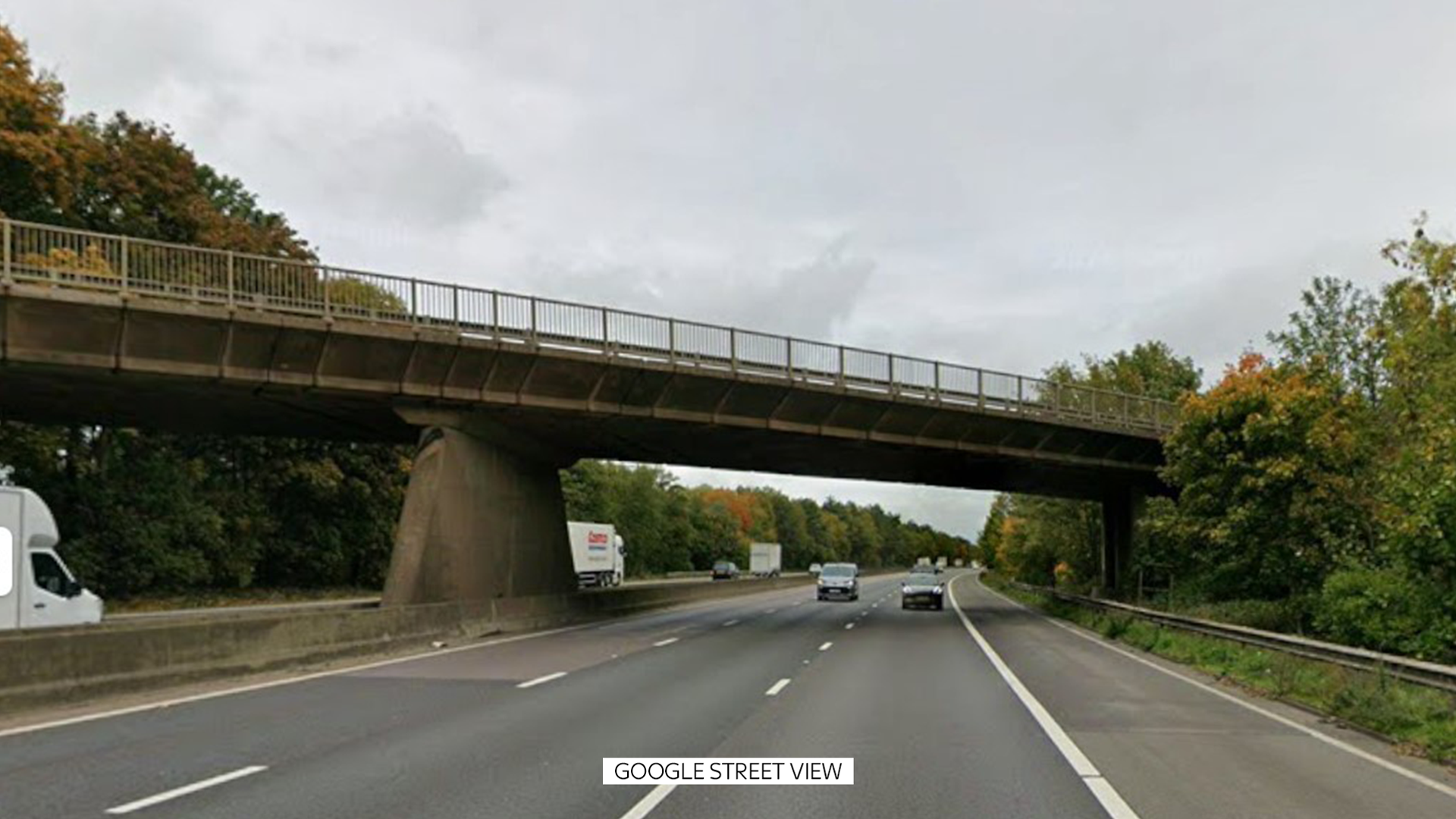 Two teenagers dead after car falls off bridge and crashes into minibus on motorway