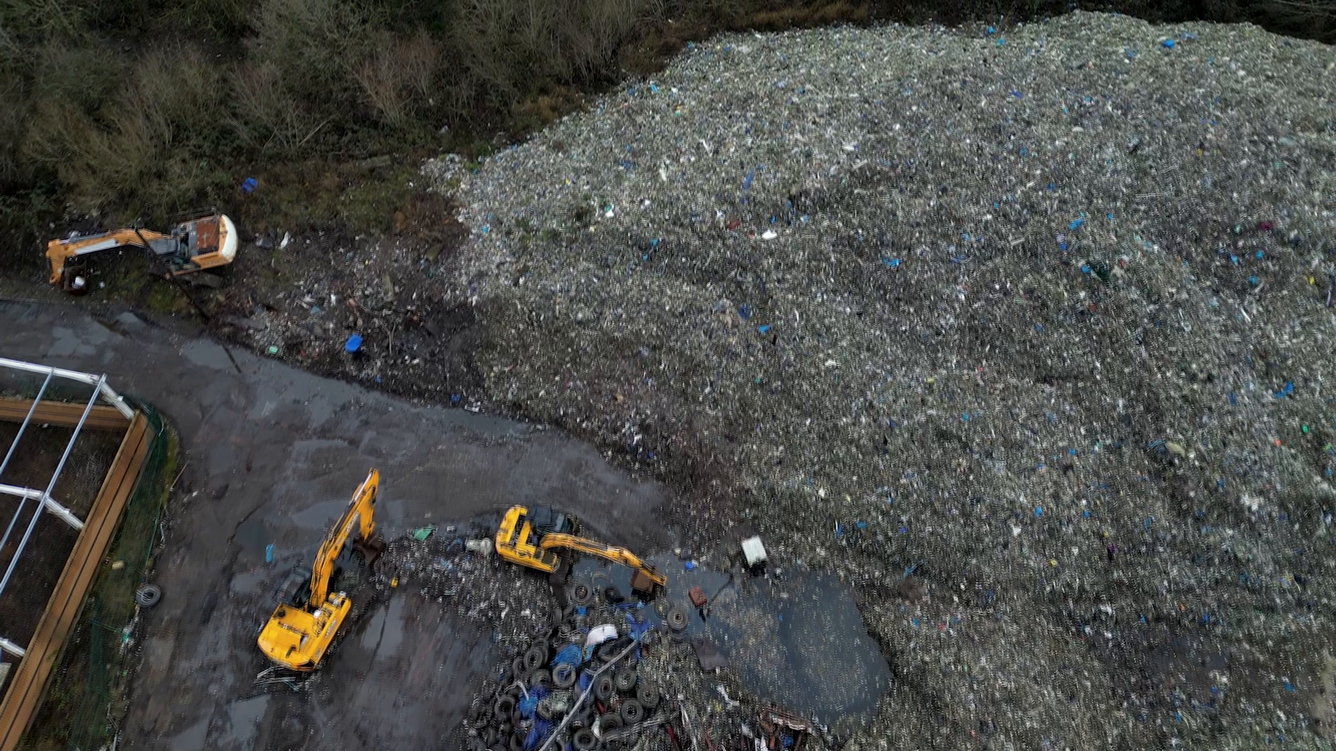Man arrested for offences linked to huge illegal waste site in Wigan