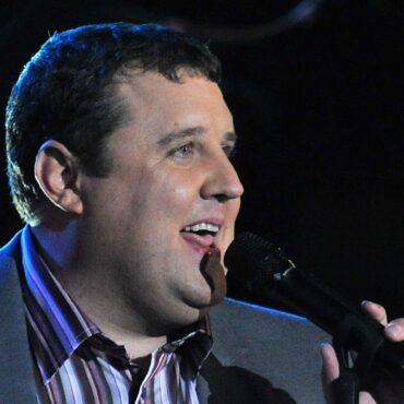 Teenager arrested on suspicion of bomb hoax after Peter Kay arena evacuation