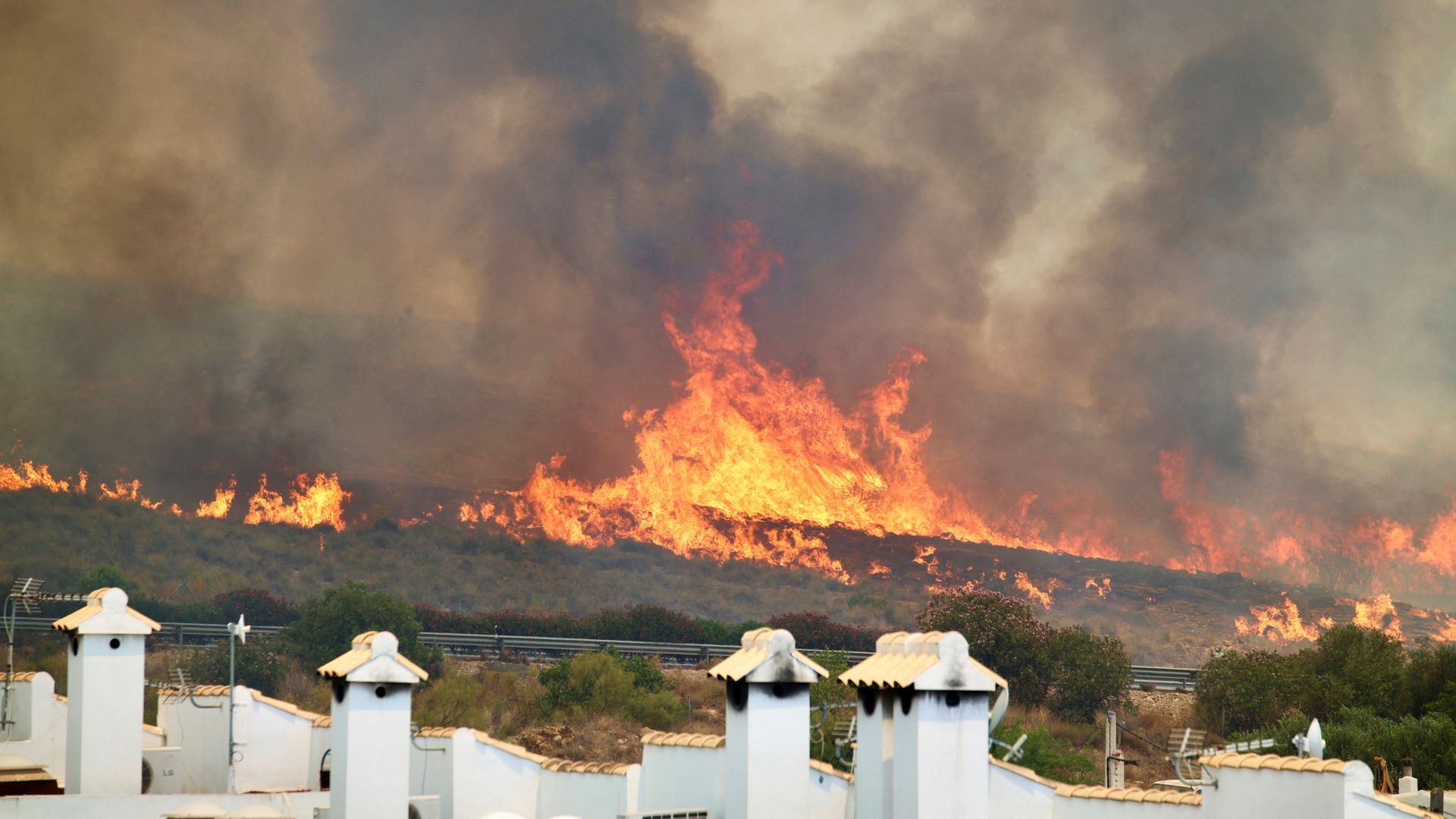 British woman becomes 13th person to die after wildfire in Spain, officials say