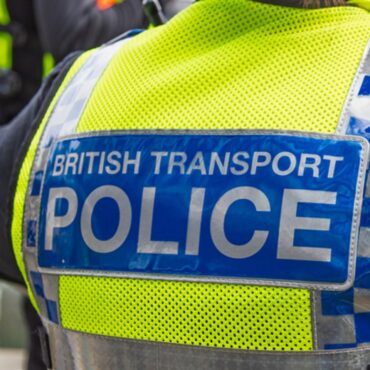 Man dies after collision between train and van