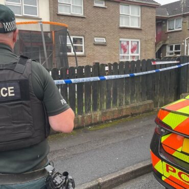 Murder arrest after man found dead next to seriously injured girl
