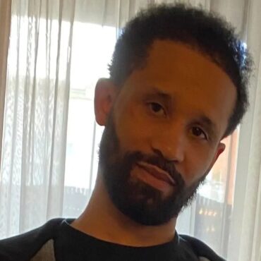 Man shot dead at memorial service gathering is named