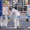Two men and two women arrested after police officer shot
