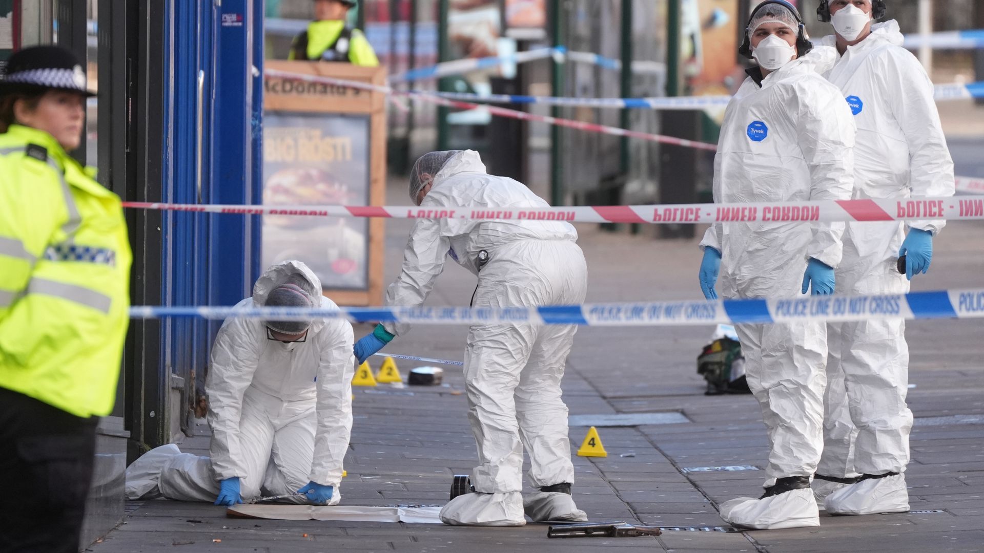 Two men and two women arrested after police officer shot